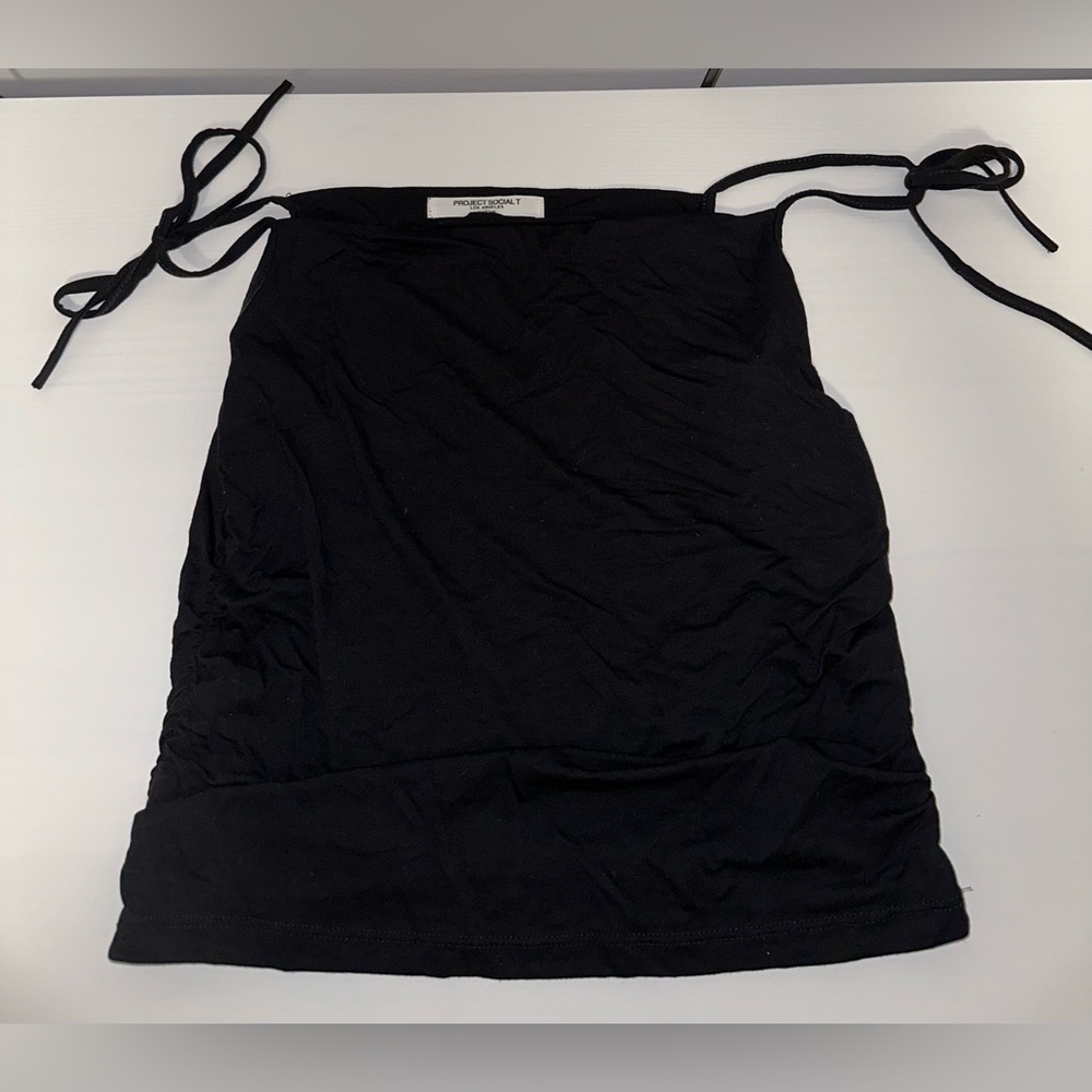 Black tank top with bow tie on top. Rouched on sides.